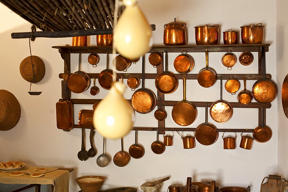 Rack with copper pots in the kitchen, Museum Grazia Deledda, Nuoro, Sardinia, Italy, Europe