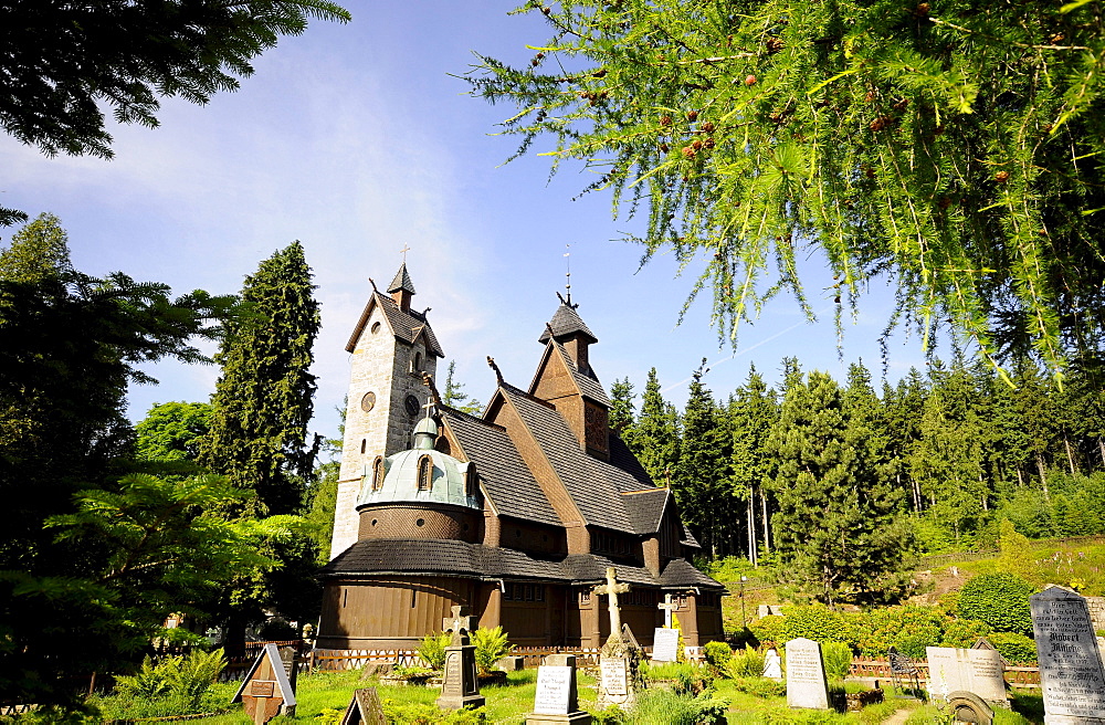 Stave church Wang and graveyard in the sunlight, Karpacz, Bohemian mountains, lower-Silesia, Poland, Europe