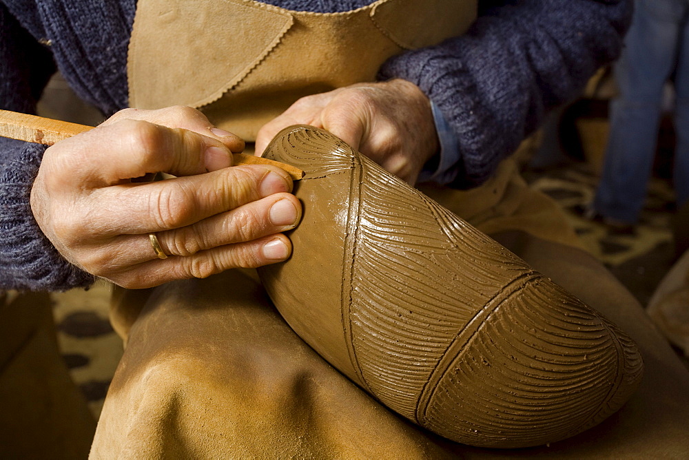 Potter engraving a bowl, ceramic, pottery, workshop, Ramon Barreto Leal, Ceramica El Molino, Hoyo de Mazo, Villa de Mazo, La Palma, Canary Islands, Spain, Europe