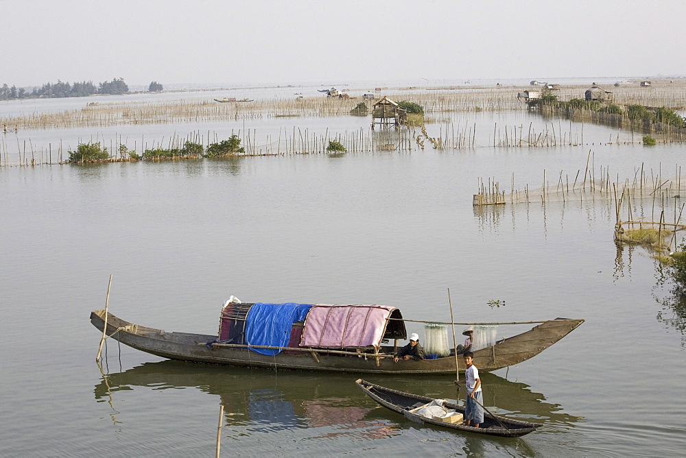 Fishing boats on a river, Quang Nam Province, Vietnam, Asia