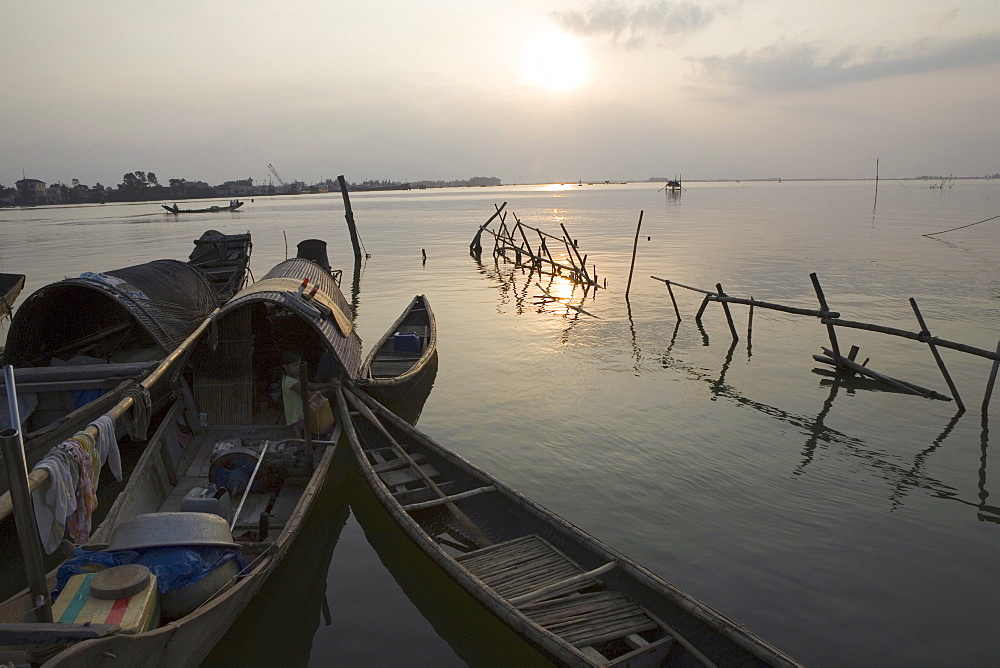 Fishing boats on the Thu Bon River at sunset, Quang Nam Province, Vietnam, Asia