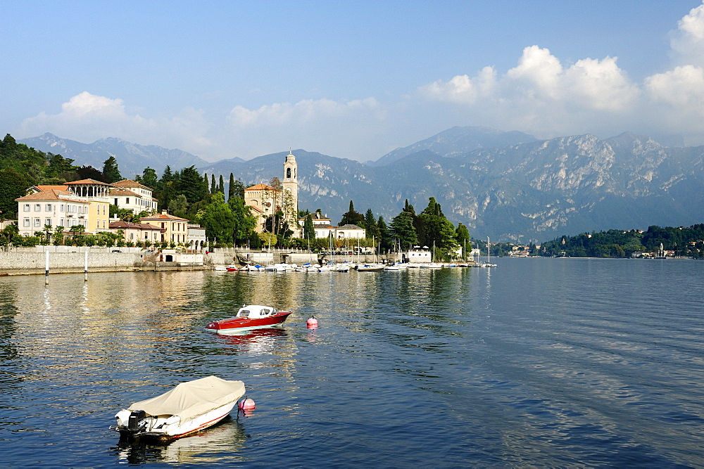 View over Lake Como to Tremezzo with Bergamo Alps in background, Lombardy, Italy