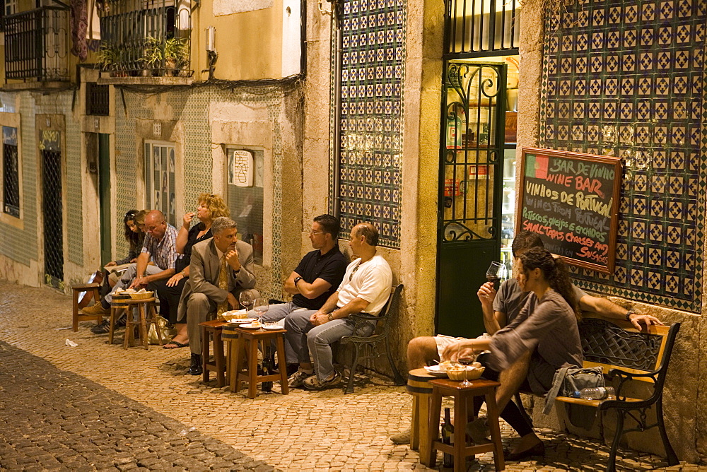 People outside the Alfaia Wine Bar in Bairro Alta District, Lisbon, Lisboa, Portugal, Europe