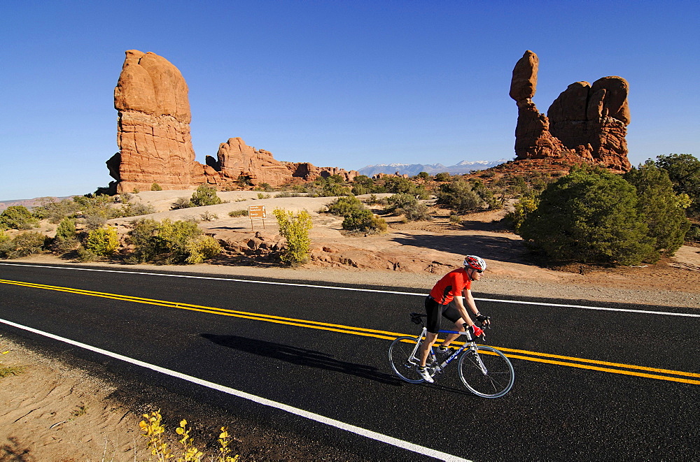 Racing cyclist, Arches National Park, Moab, Utah, USA