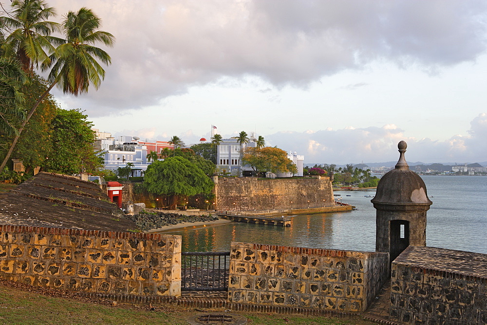 The historic Old Town under cloudy sky, Puerta de San Juan, San Juan, Puerto Rico, Carribean, America