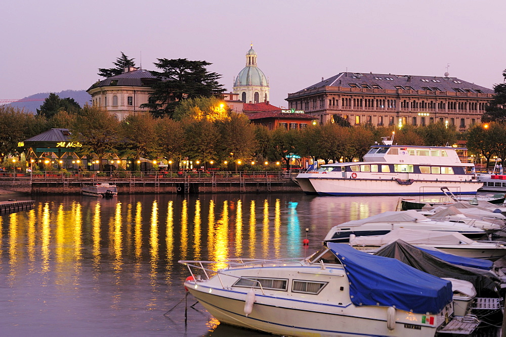 Boats in harbor of Lake Como, cathedral in background, Como, Lombardy, Italy