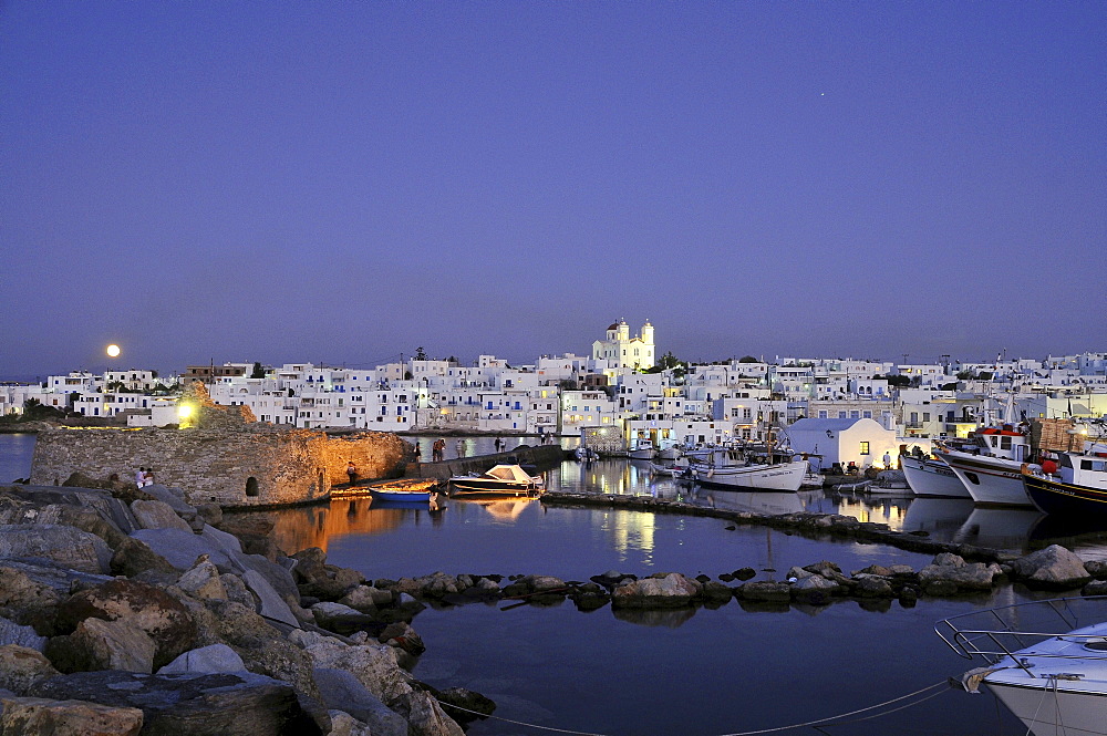 Houses and church at moonrise, Naoussa, island of Paros, the Cyclades, Greece, Europe