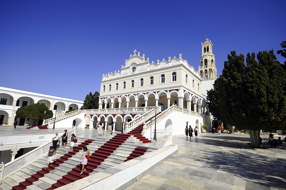 People on the stairs in front of pilgrimage basilica Panagia Evangelistria, Tinos-town, island of Tinos, the Cyclades, Greece, Europe