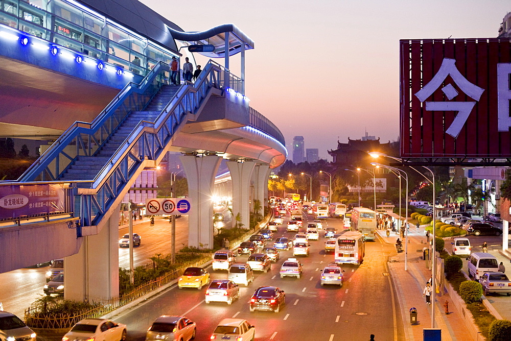 Cars and pedestrians on the street in the evening, Lianqian West Road, Huli District, Xiamen, Fujian, China, Asia