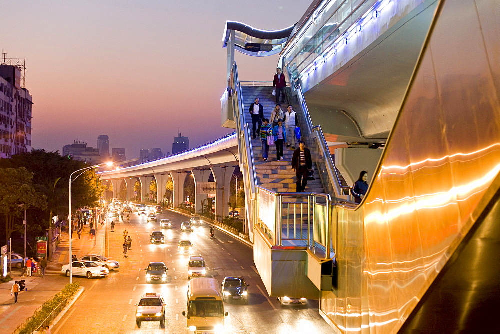 Cars and pedestrians on the street in the evening, Lianqian West Road, Huli District, Xiamen, Fujian, China, Asia