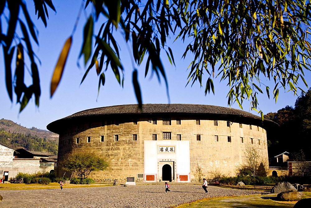 Village Hongkeng of the Hakka people, traditional earthen roundhouse Zhenchenglou in the sunlight, Hongkeng, Longyan, Fujian, China, Asia