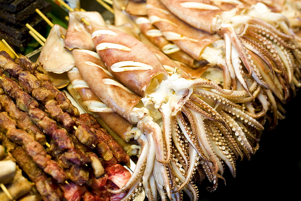 Octopus and meat skewers, snacks at Shilin night market, Taipei, Republic of China, Taiwan, Asia