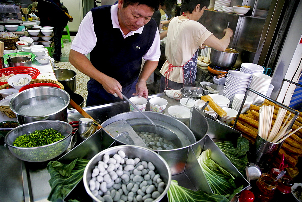 People cooking at a noodle cook shop at Tainan, Republic of China, Taiwan, Asia