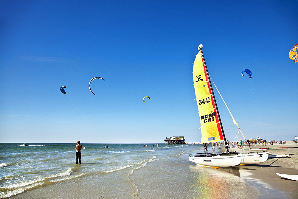 Kitesurfing near beach, Sankt Peter-Ording, Schleswig-Holstein, Germany