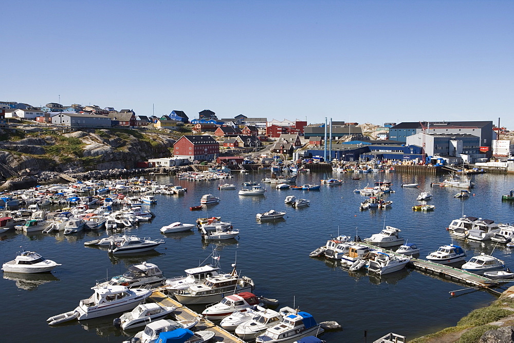 Fishing boats at harbour and Royal Greenland Seafood Processing Plant, Ilulissat (Jakobshavn), Disko Bay, Kitaa, Greenland