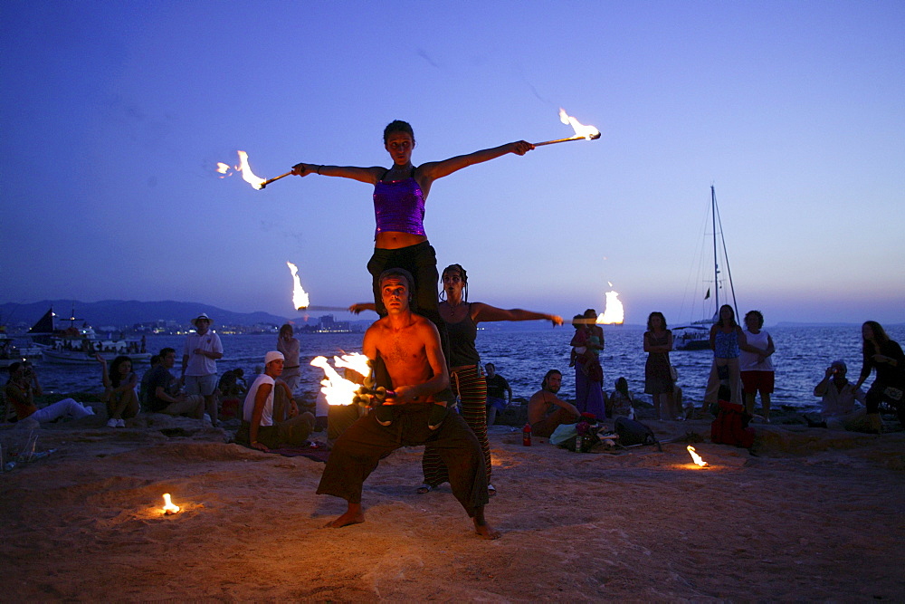 Jugglers and fire-eaters at CafÃˆ del Mar Ibiza, Balearic Island, Spain