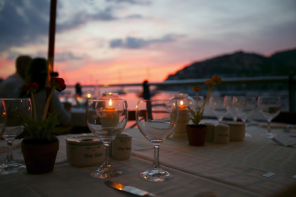 Wein glasses by candlelight, Mar Blau restaurant, Andratx, Mallorca, Balearic Islands, Spain