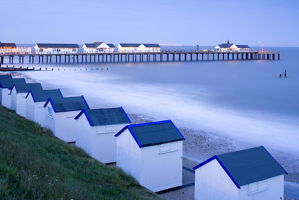 Beach huts and Pier in Southwold, East Anglia, Suffolk, England, Great Britain, Europe