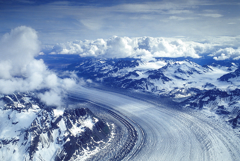 Aerial view of Tokositna Glacier under clouded sky, Alaska Range, Alaska, USA, United States of America