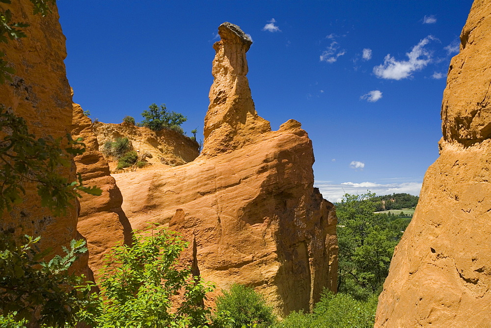 Colorado Provencal, rocks of ochre under a blue sky, Rustrel, Vaucluse, Provence, France