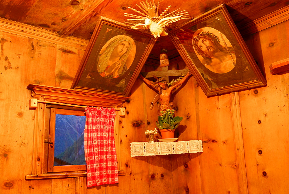 crucifix in the living room of mountain farmhouse, valley Pfossental, Texelgruppe range, Oetztal range, South Tyrol, Italy