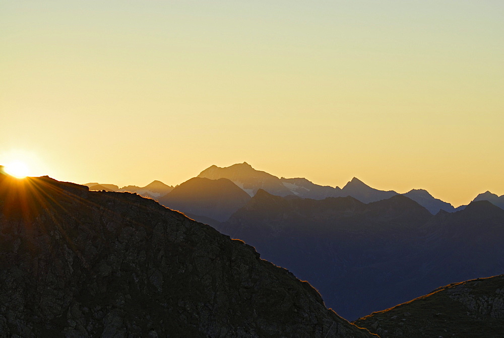 sunrise above Reisseck range, lake Wangenitzsee, Schobergruppe range, Hohe Tauern range, National Park Hohe Tauern, Carinthia, Austria