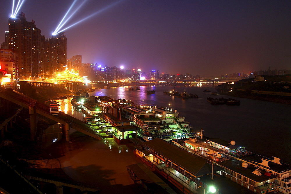 River cruisers infront of the skyline, Chongqing, China, Asia