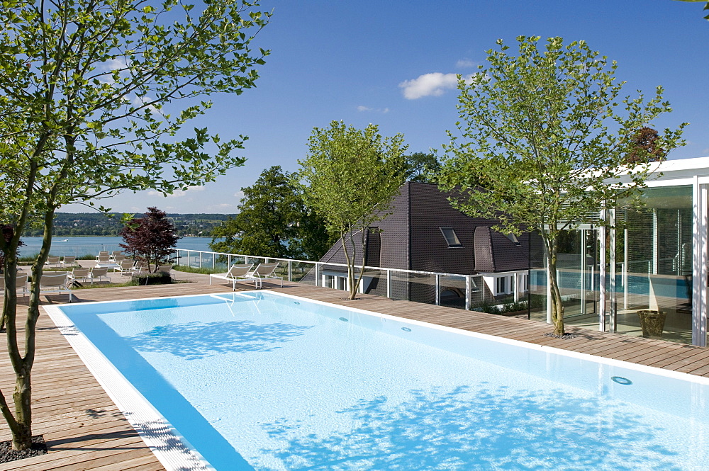 Deserted pool at the roof terrace in the sunlight, Hotel Riva, Constance, Lake Constance, Baden-Wurttemberg, Germany