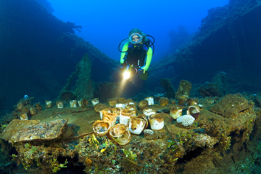 Diver discover Tableware and Artifacts on USS Saratoga, Marshall Islands, Bikini Atoll, Micronesia, Pacific Ocean