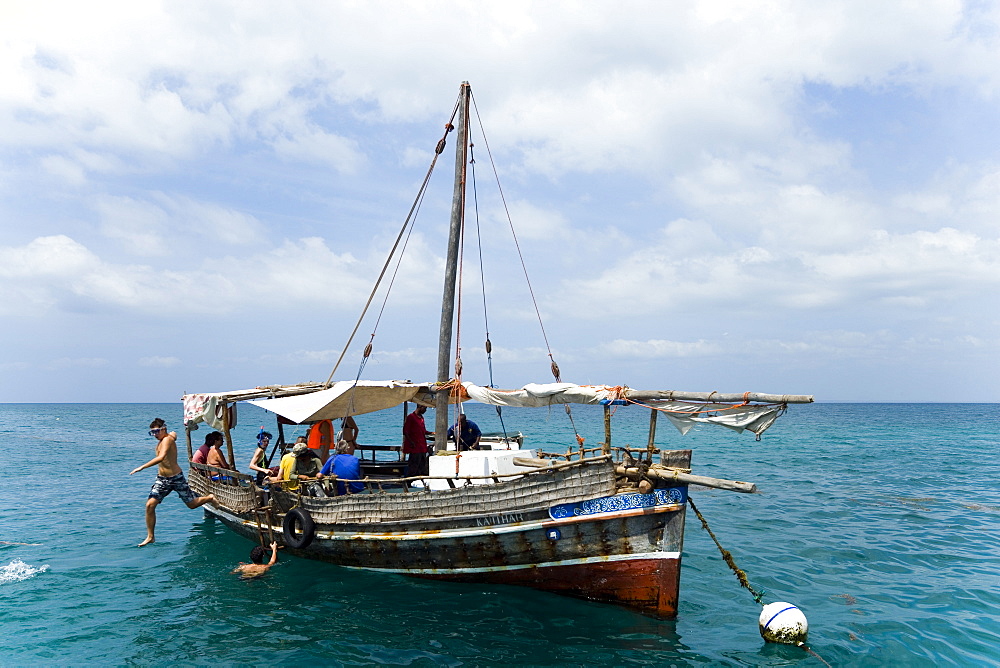 Persons jumping into water for snorkeling, Snorkeling and Diving Trip, Kisite-Mpunguti Marine National Park, Coast, Kenya