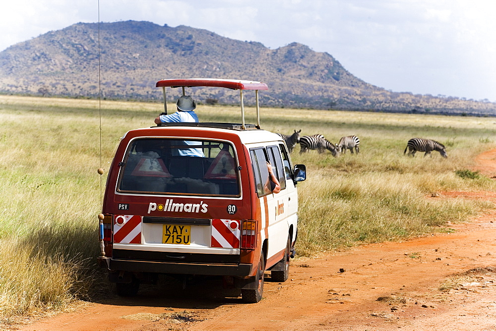 Safari bus on the way in Tsavo East National Park, Coast, Kenya