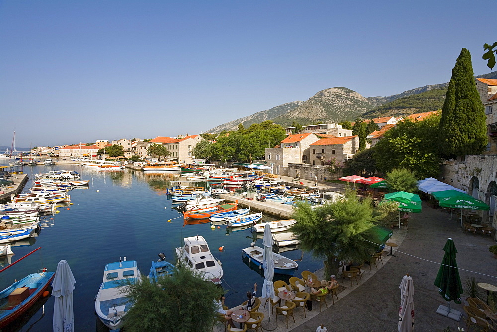 Boats at Bol harbour under blue sky, Brac Island, Dalmatia, Croatia, Europe