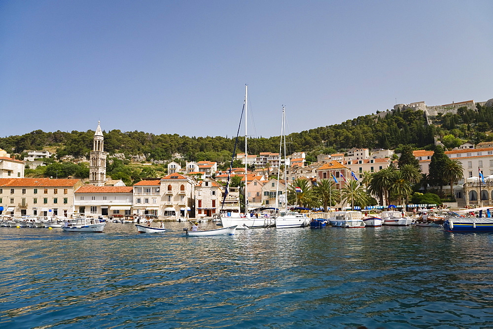 Boats and the harbour of Hvar under blue sky, Hvar Island, Dalmatia, Croatia, Europe