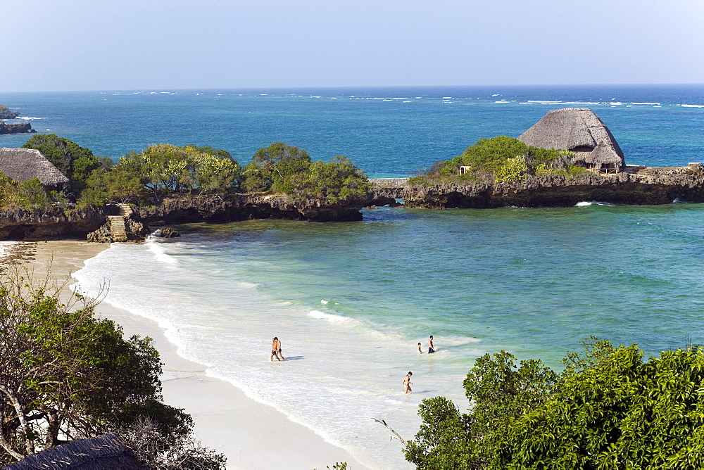 Tourists at beach, The Sands, Chale Island, Coast, Kenya