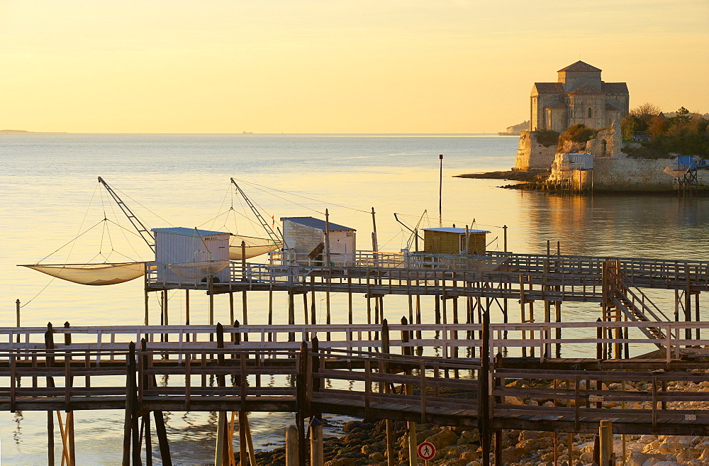 Sunset, Fishing huts and church, The Way of Saint James, Chemins de Saint-Jacques, Via Turonensis, Talmont sur Gironde, Dept. Charente-Maritime, RâˆšÃ‰Â¬Â©gion Poitou-Charentes, France, Europe