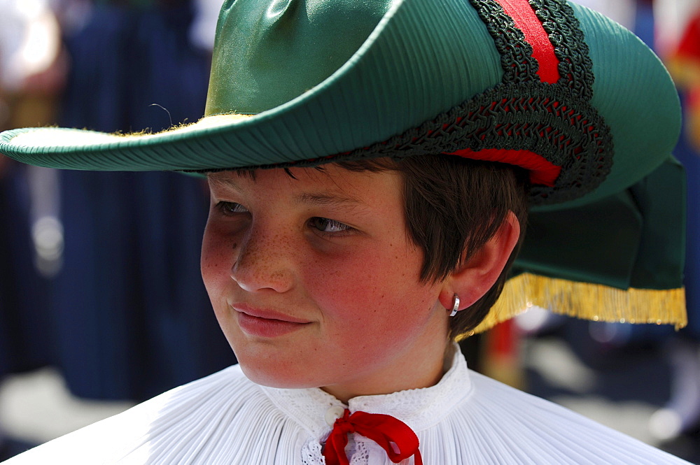 Detail of traditional costume in Kastelruth, boy wearing hat, music band, Kastelruth, South Tyrol, Italy