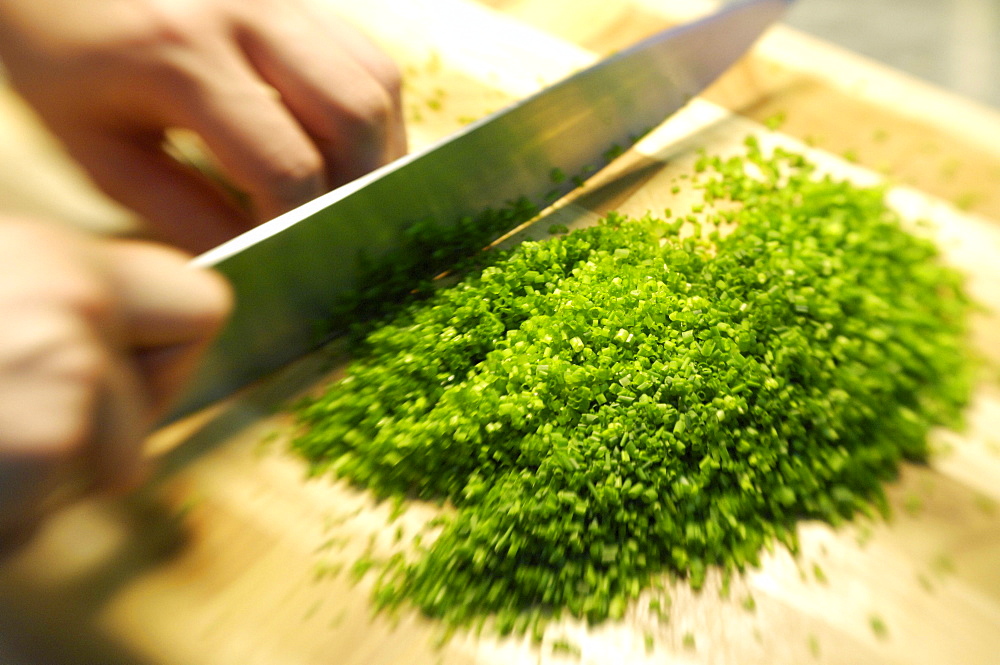 Minced chives and a knife on a cutting board, Restaurant Steinbock, Villanders, Valle Isarco, South Tyrol, Italy, Europe