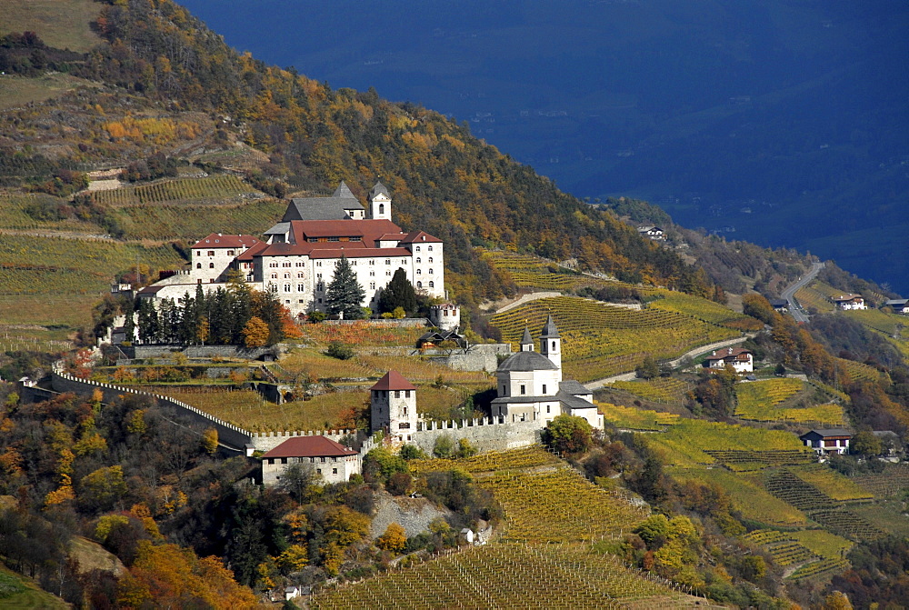 Saeben abbey at a mountainside in autumn, Klausen, Valle Isarco, South Tyrol, Italy, Europe