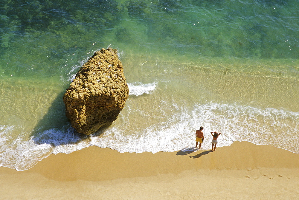 View at the beach and people on the waterfront, Praia da Marinha, Algarve, Portugal, Europe