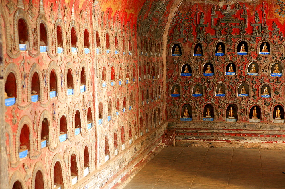 little Buddha statues in the wall of the pagoda of the Shwe Yan Bye- Monastery, Nyaungshwe, Inle Lake, Shan State, Myanmar, Burma, Asia