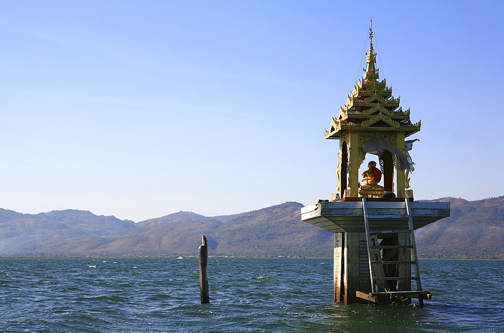 Buddha statue in the middle of the lake in the sunlight, Inle Lake, Shan State, Myanmar, Burma, Asia