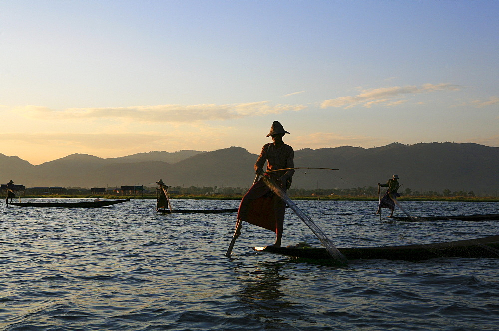 Intha fishermen with nets in the evening light, Inle Lake, Shan State, Myanmar, Burma, Asia