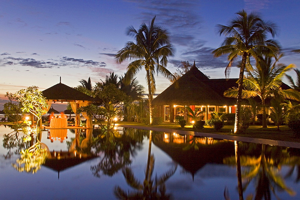 Resort Moevenpick at twilight, luxery table in small pavillion, sunset, south coast of Mauritius, Africa