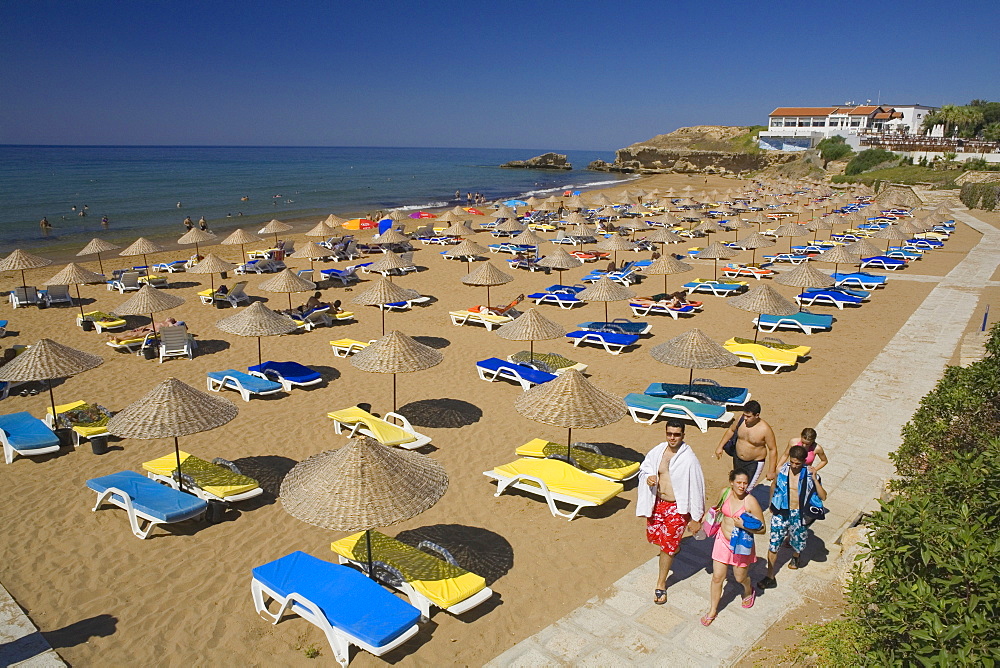 People walking to the beach, Acapulco Beach, Acapulco Beach Club and Resort Hotel, 10km east of Kyrenia, Girne, Kyrenia, North Cyprus, Cyprus