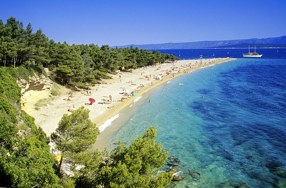 People on the beach on a tongue of land under blue sky, Golden Horn, Brac island, Croatian Adriatic Sea, Dalmatia, Croatia, Europe