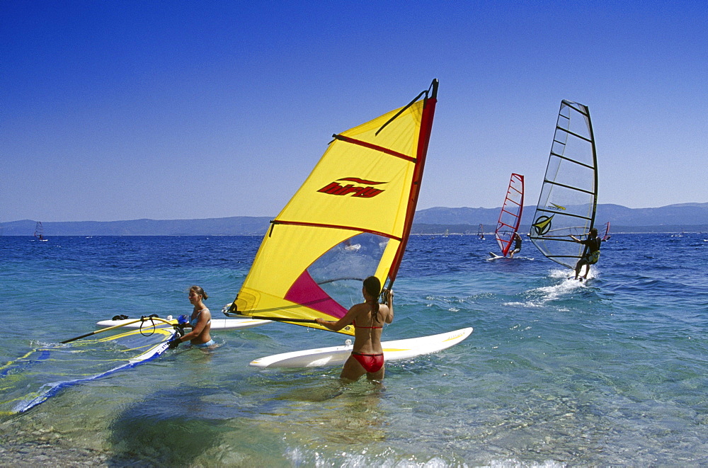 Sail boarder at Golden Horn under blue sky, Brac island, Croatian Adriatic Sea, Dalmatia, Croatia, Europe