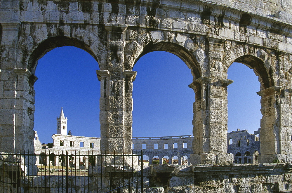 Roman amphitheater under blue sky, Pula, Croatian Adriatic Sea, Istria, Croatia, Europe