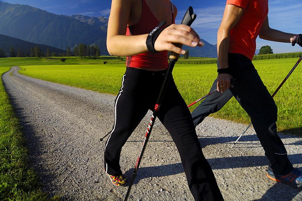 A couple nordic walking, Tyrol, Austria, Europe