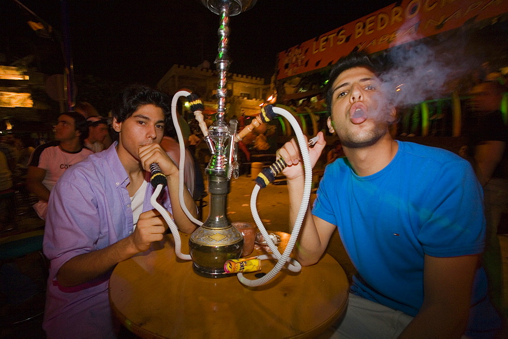 Two young men smoking a water pipe, nightlife, Club, Bar, Agia Napa, Cyprus