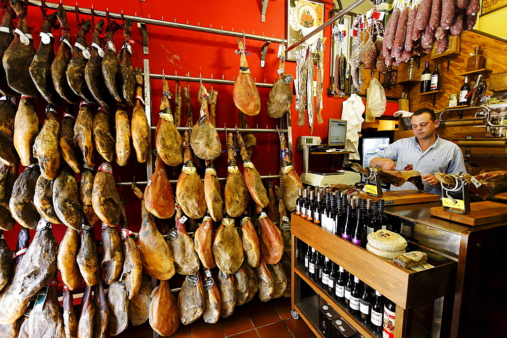 Seller inside a butchery, Ronda, Andalusia, Spain